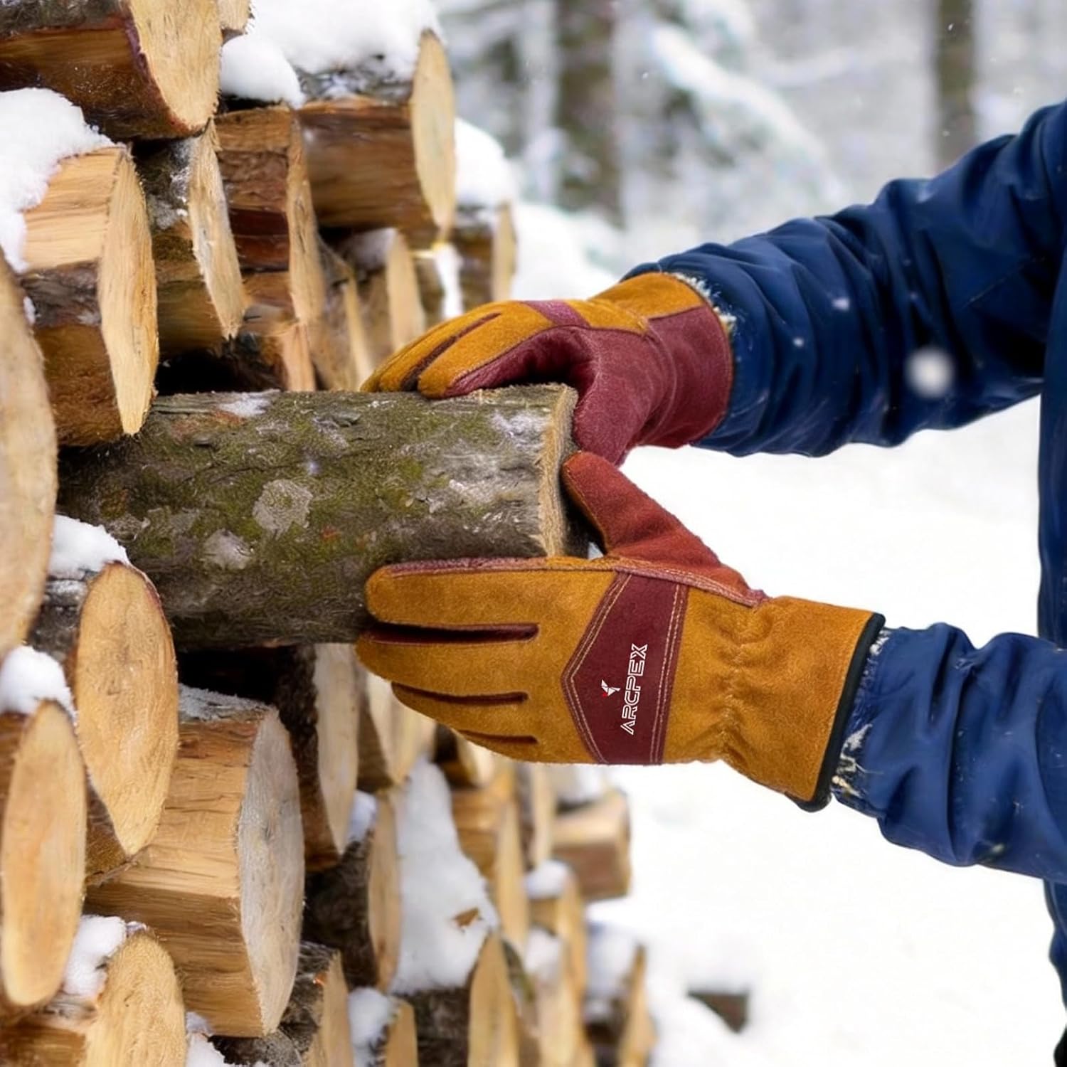 Person in winter clothing and gloves stacking logs in a snowy forest
